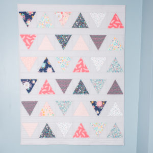 Baby quilts: Triangle pop quilt pattern by emily of quiltylove.com