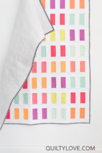 Coins quilt pattern by Emily of Quiltylove.com. Beginner coin quilt pattern.