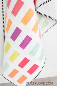 Coins quilt pattern by Emily of Quiltylove.com. Beginner coin quilt pattern.