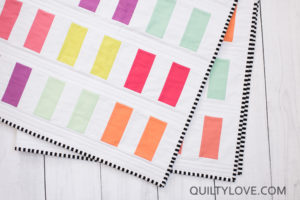 Coins quilt pattern by Emily of Quiltylove.com. Beginner coin quilt pattern.