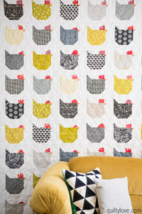 chicken quilt by emily of quiltylove with yellow couches