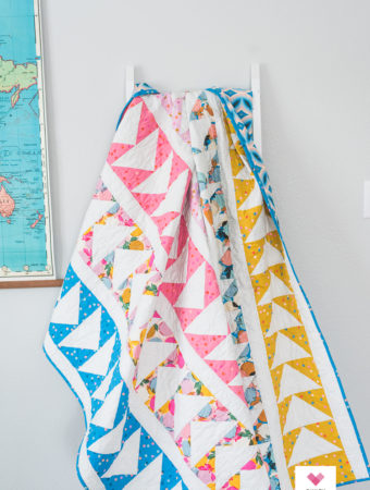 Flying geese quilt by Emily of quiltylove.com.