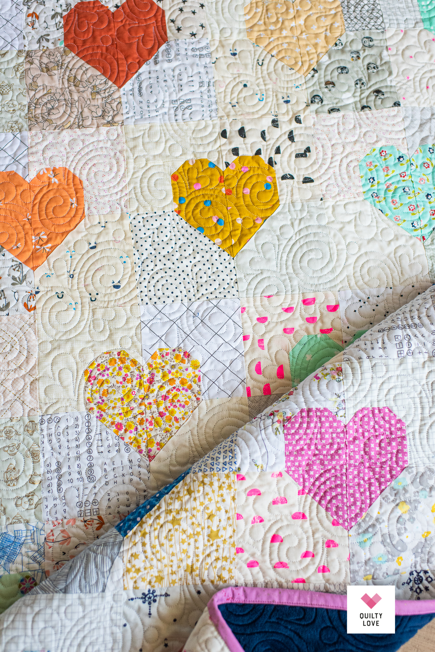 Simple Rainbow Heart Gems quilt - Quilty Love