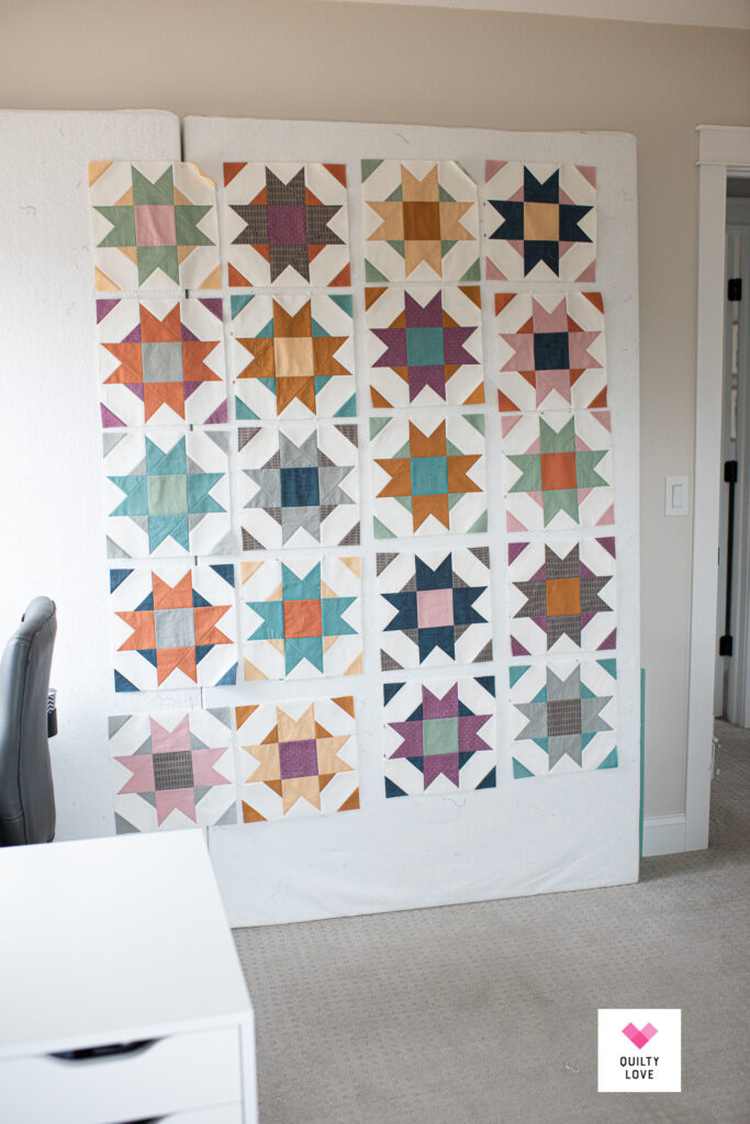 Compass Star quilt on design wall in sewing room.
