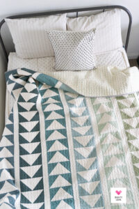 Simple and modern flying geese quilt sewn up in Art Gallery Pure Solids.